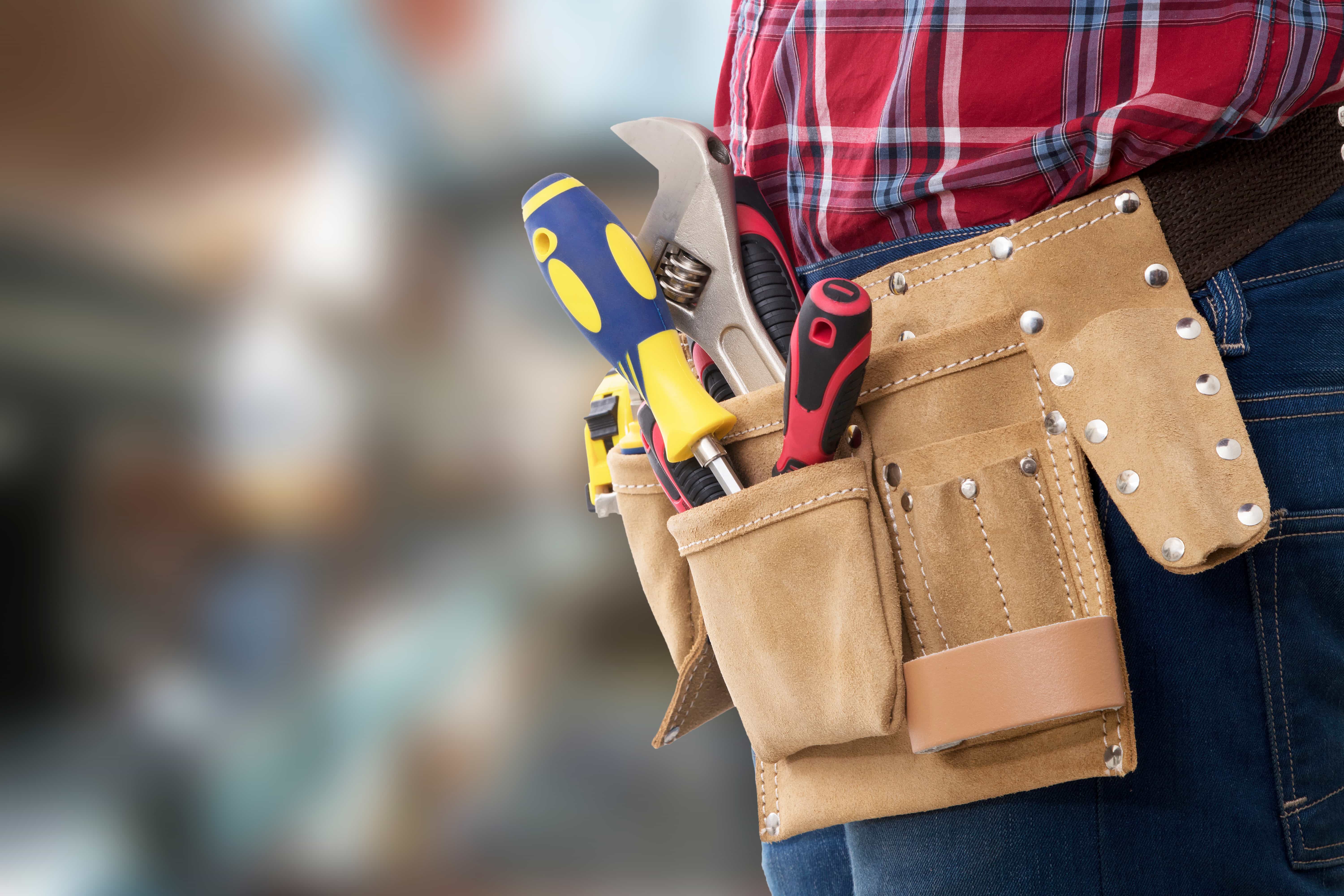 Handyman completing a home repair project